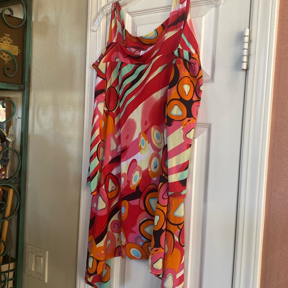 Come N See multi-colored, stretch material.